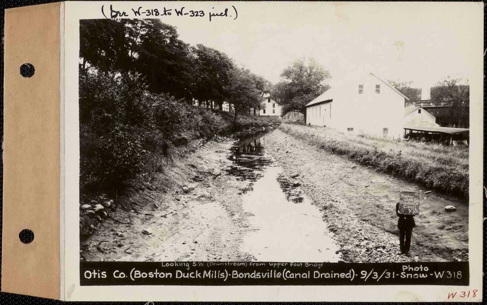 Otis Co. (Boston Duck Mills), canal drained, Bondsville, Palmer, Mass., Sep. 3, 1931 Looking southwest (downstream) from upper foot bridge, Massachusetts Archives - undated