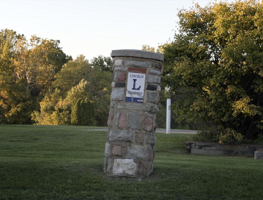 A now (2016) cockeyed stone monument honoring the old Lincoln Highway that passes through Bucyrus, a small city in  central Ohio