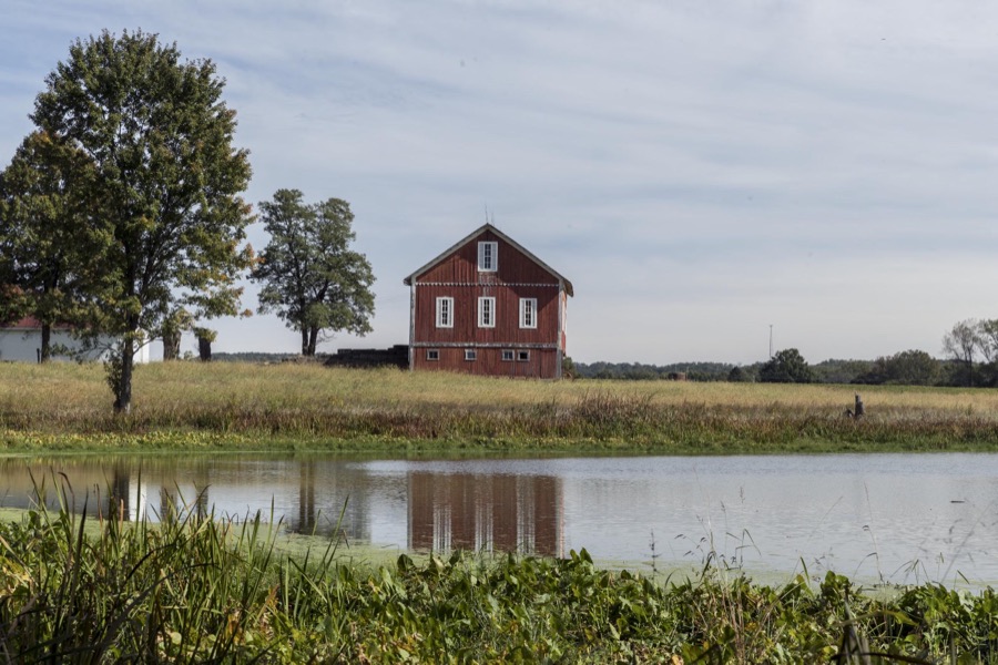The image of this attractive barn, near Navarre in Stark County, Ohio, reflects in an adjacent pond