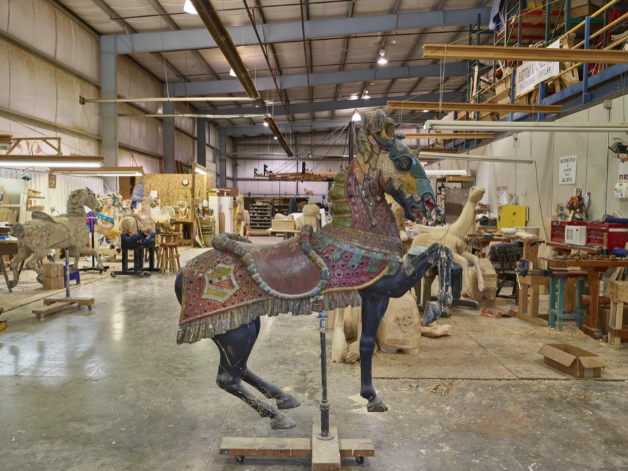 In Mansfield, Ohio, works in progress await completion at the Carousel Works, the world's largest maker of carousels, sometimes called "merry-go-rounds"