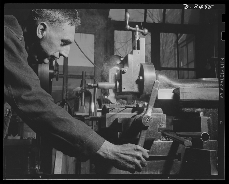 Conversion. Toy furniture to dies for incendiary bombs. This milling machine formerly used in producing metal furniture for doll houses, has a much more important task these days. It's scraping steel plate to be used in bomb dies. Location: a small factory, somewhere in the middle west. Sivon Machine Company, Painesville, Ohio