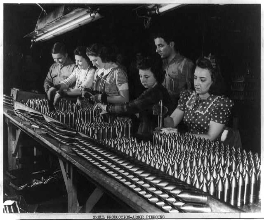 Aluminum paint production. Women work alongside of men in this Midwest aluminum factory now converted to production of war materials. These young workers are assembling 37mm armor-piercing shot prior to heat treating operations
