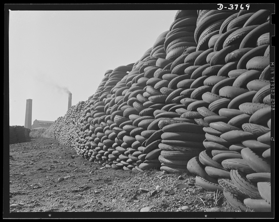 Rubber reclamation. Scrap tires mobilized for Victory. Millions of discarded casings cover more than 100 acres at one Midwest recovery plant. Systematic piling and sectional arrangement reduce fire hazard. Special processes will separate metal from the tires and tube bodies. The reclaimed material will be used to manufacture thousands of essential mechanical rubber products. Firestone