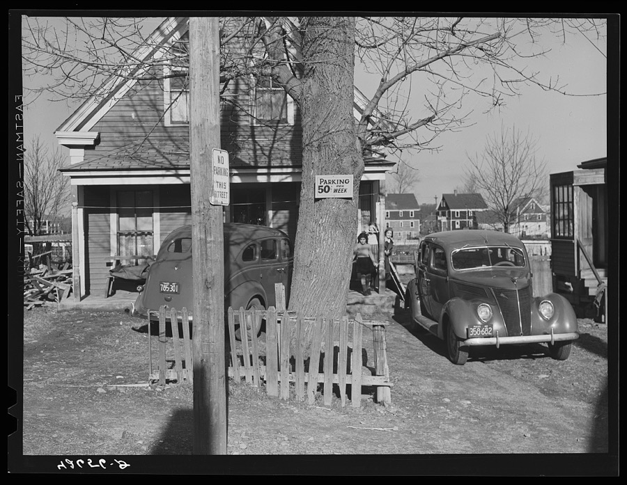 House on Winter Street, Quincy, Massachusetts. Because of lack of parking facilities, people living in the vicinity of the shipyards are renting car space in their backyards and the lots around their houses for "fifty cents a week."