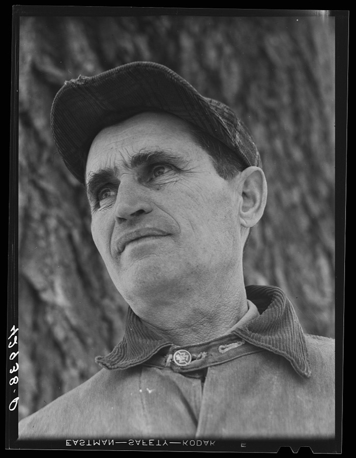 Mr. Joquin Silva, Portuguese poultry and market farmer. His two sons work in town. Chelmsford, Massachusetts