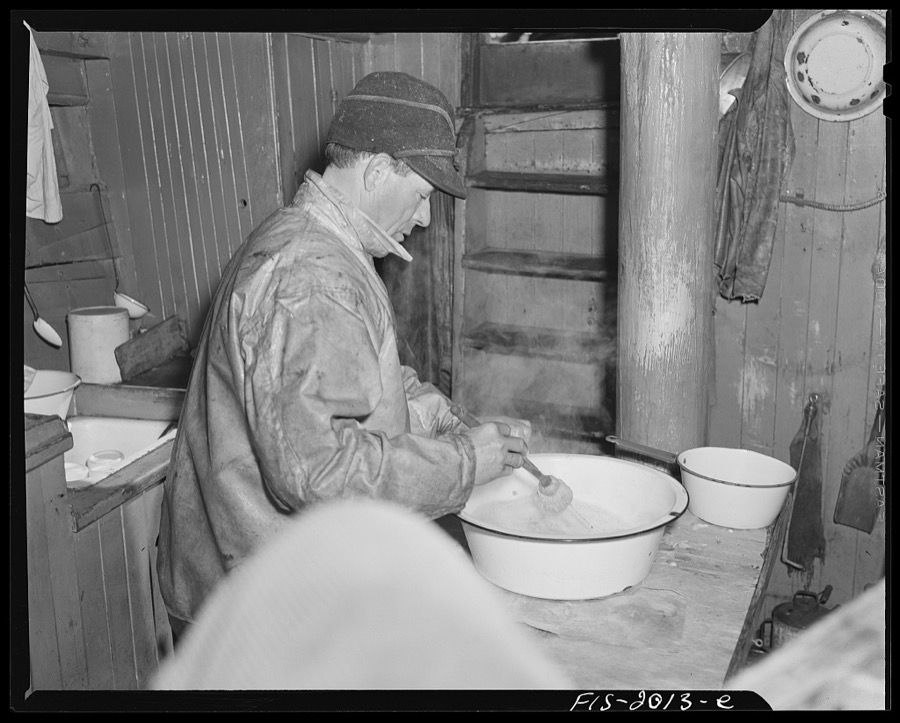 Provincetown, Massachusetts. Getting breakfast aboard the Portuguese trawler, Frances and Marion