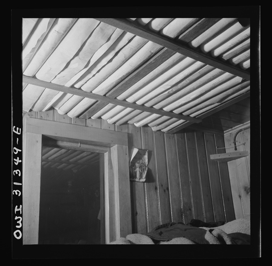 On board the fishing boat Alden out of Gloucester, Massachusetts. Maps of different sea routes in the ceiling of the skipper's cabin
