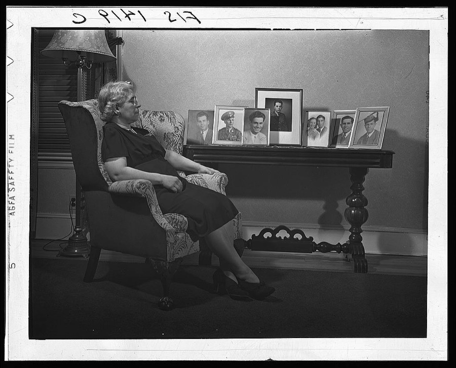 New Bedford, Massachusetts. Portuguese mother with pictures of her sons who are all in service
