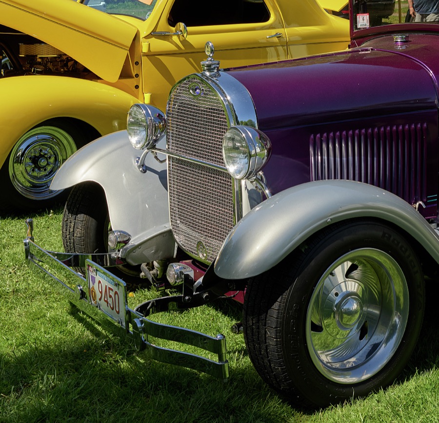 Among the exhibited autos at a small antique-car show on the green in [Belchertown], Massachusetts