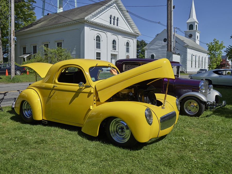 Among the exhibited autos at a small antique-car show on the green in [Belchertown], Massachusetts