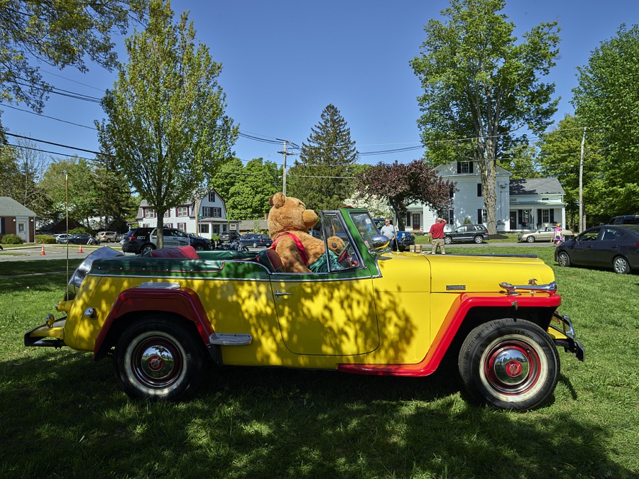 This colorful 1949 Willys Jeepster, exhibited at a small antique-car show on the green in [Belchertown], Massachusetts, is one of several small cars used by the Melha Shriners, a funloving Masonic group that delights crowds in area parades